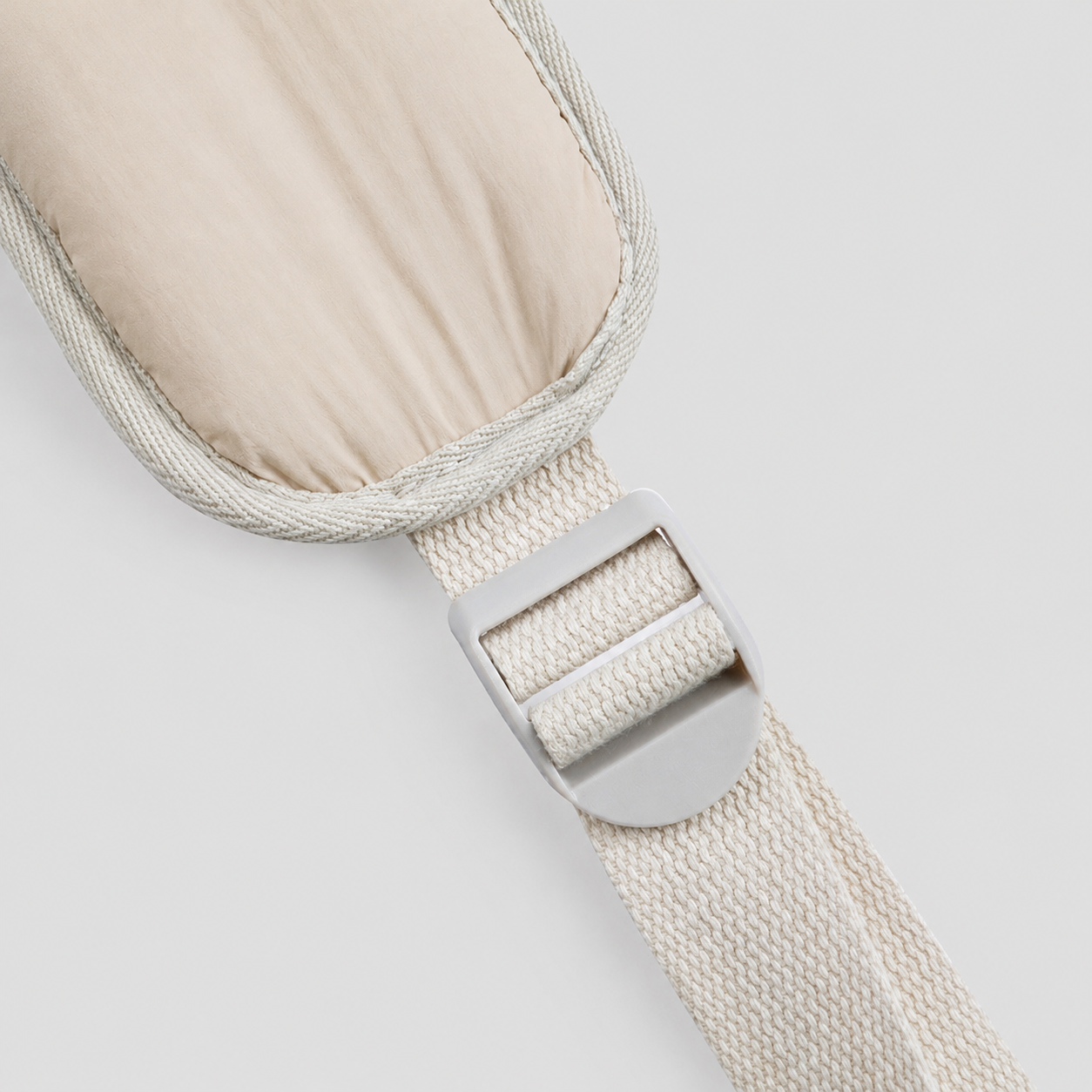 Adjustable buckle on a pet sling carrier strap
