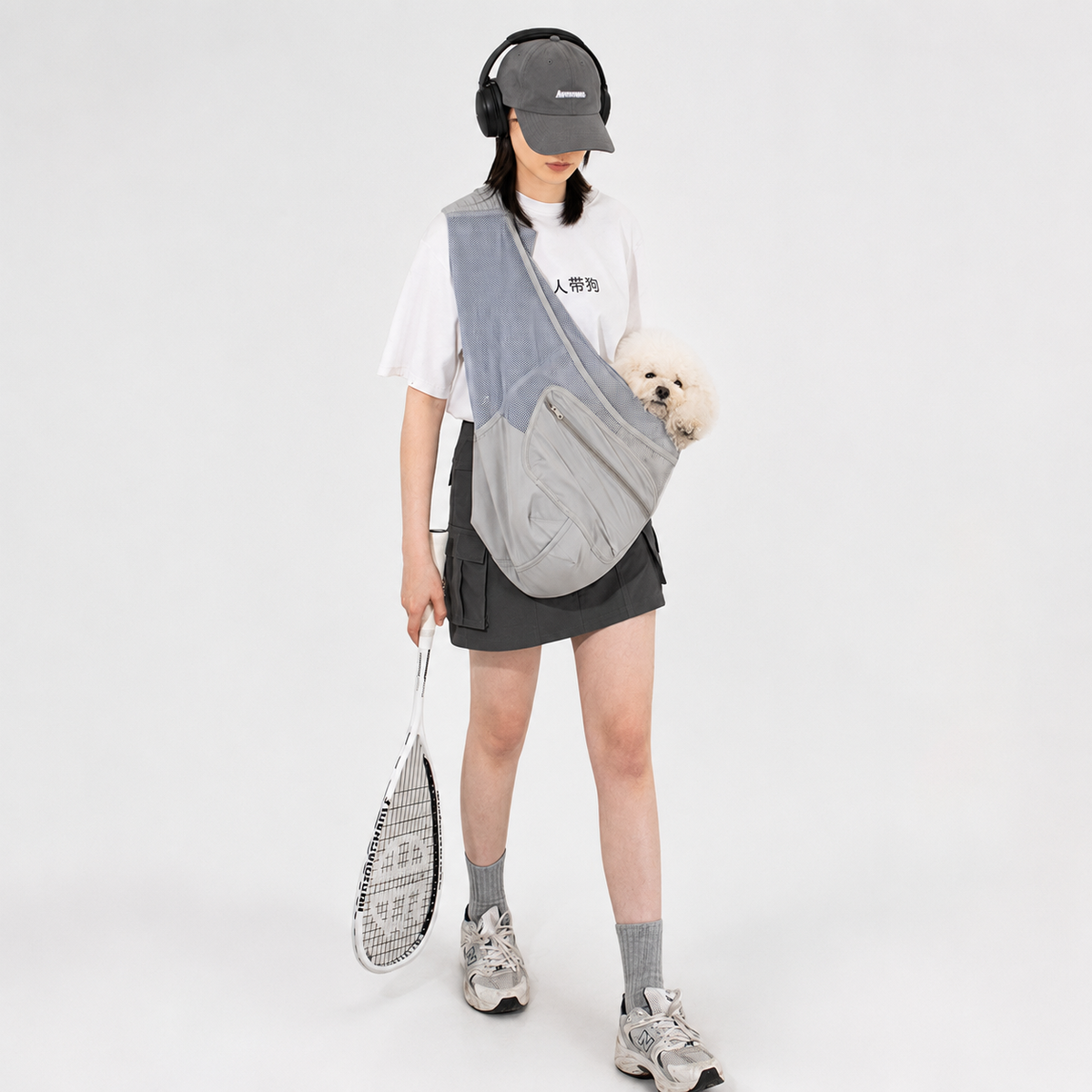 Hands-free grey pet sling used during an active outing