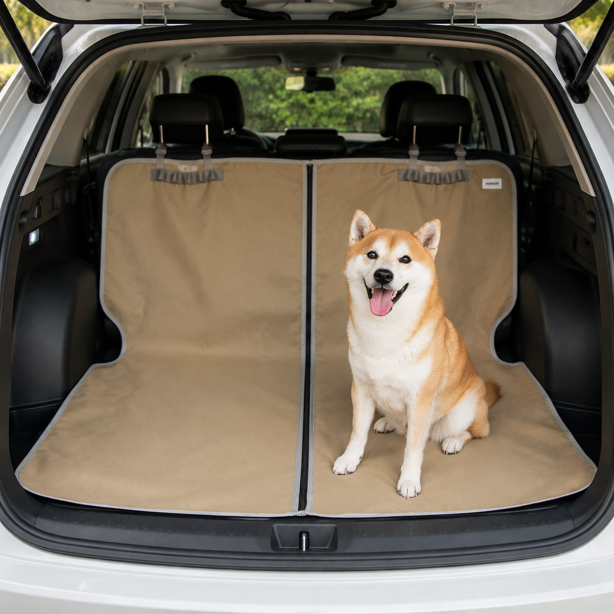 Dog sitting on a protector inside an SUV cargo area